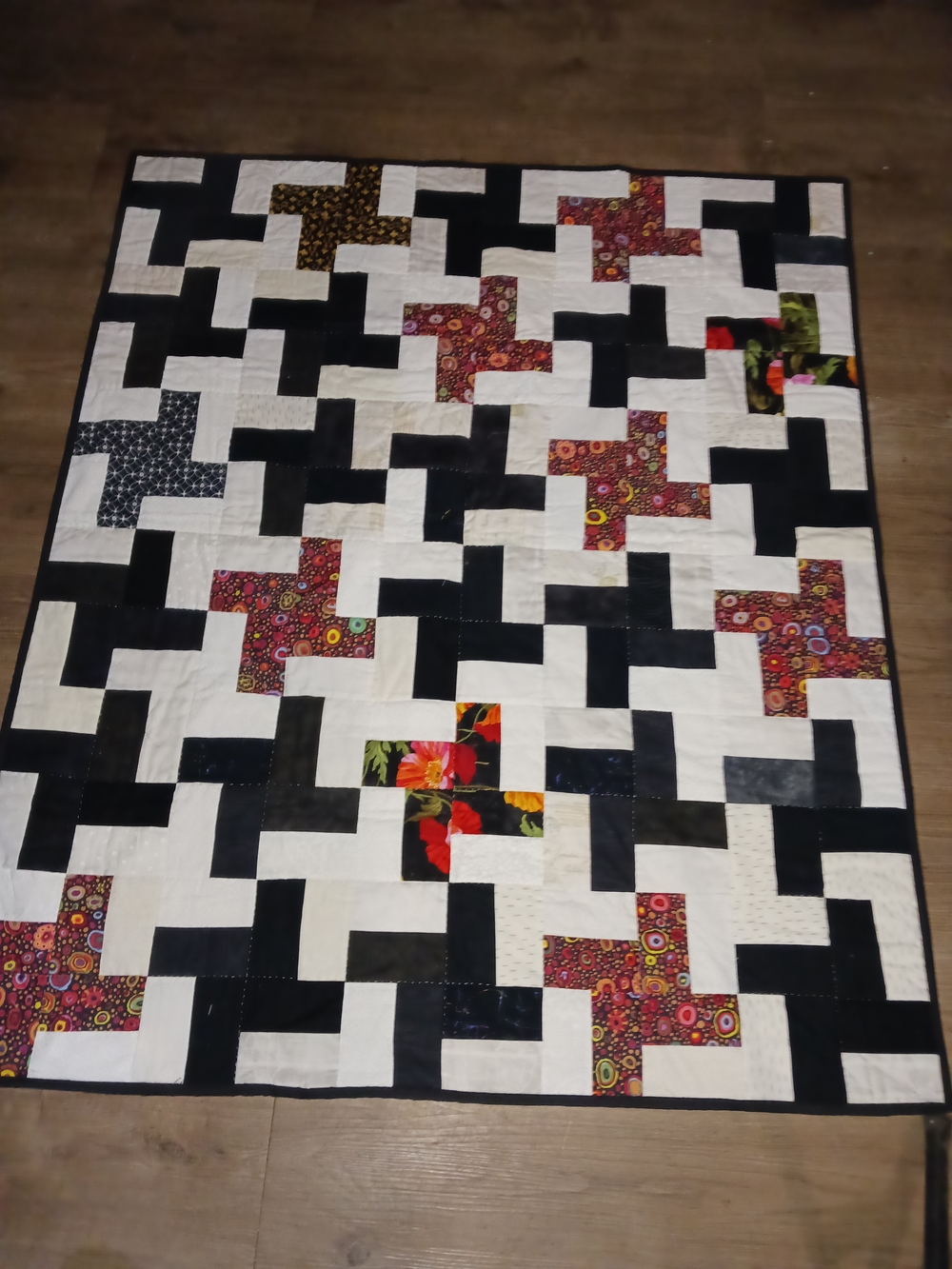 Handmade Patchwork Quilt with Black, White & Multicolor Floral Accents